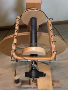 the bobbin and flyer of a louet S10 spinning wheel
